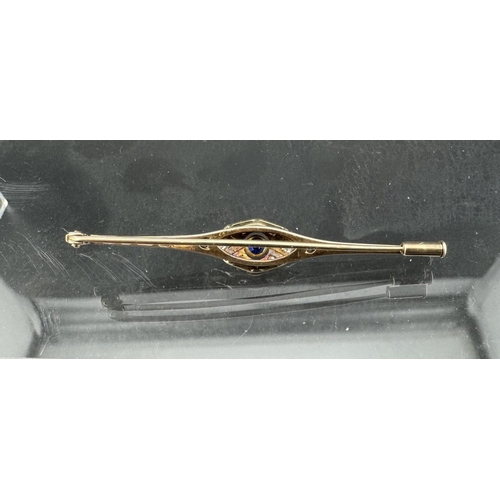 657 - Jewellery: Jewellery: A Finnish 14ct gold Art Deco diamond and sapphire bar brooch, hallmarked for 1... 