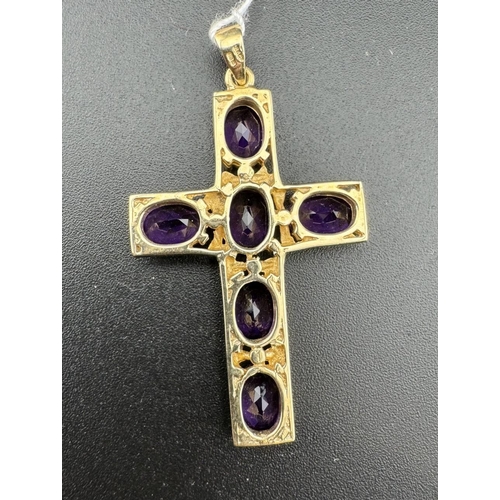 659 - Jewellery: Jewellery: A 9ct gold cross pendant set with six oval amethysts, 4.3cm by 2.7cm, bearing ... 