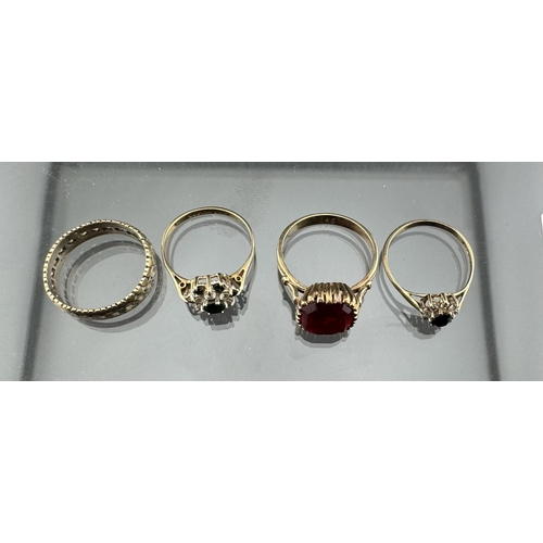 661 - Jewellery: Jewellery: A 9ct gold ring set with a solitaire faux ruby, 1.0cm by 0.8cm, UK size Q; a 9... 