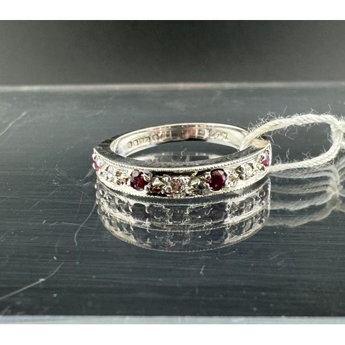 671 - Hallmarked White Gold: Hallmarked White Gold: 18ct 750 half eternity ring, diamond-ruby set, size O.... 