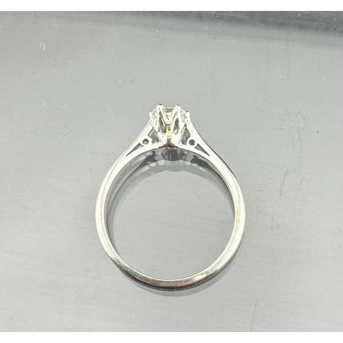 676 - Jewellery: Jewellery: Platinum and diamond solitaire ring, the stone set in a raised mount with pier... 