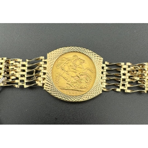 682 - Coins: Coins: An Edward VII 1903 full sovereign mounted within a 9ct gold gate bracelet with heart c... 