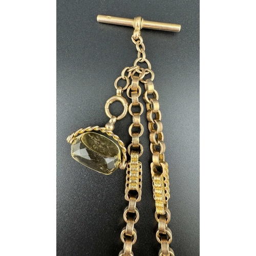 686 - Jewellery: Jewellery: A 9ct gold fancy link double Albert chain, with attached citrine swivel fob. 2... 