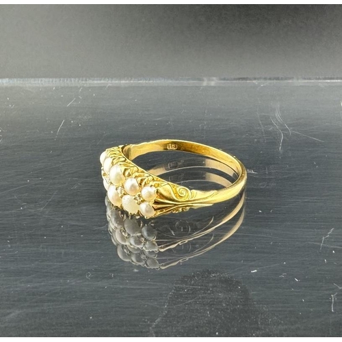 695 - Jewellery: Jewellery: An 18ct yellow gold ring, set with two rows of five graduated seed pearls. UK ... 