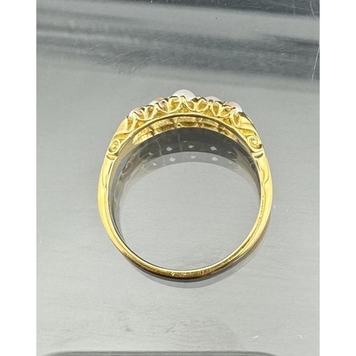 695 - Jewellery: Jewellery: An 18ct yellow gold ring, set with two rows of five graduated seed pearls. UK ... 