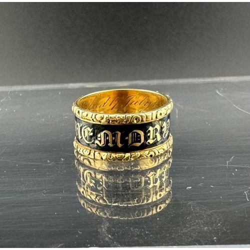 697 - Jewellery: Jewellery: An early 19th century yellow metal and enamel mourning ring, reading 'In Memor... 