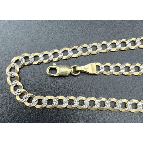 706 - Jewellery: Jewellery: A 9ct yellow and white gold flat curb link chain necklace, 61cm, 12.0g.... 