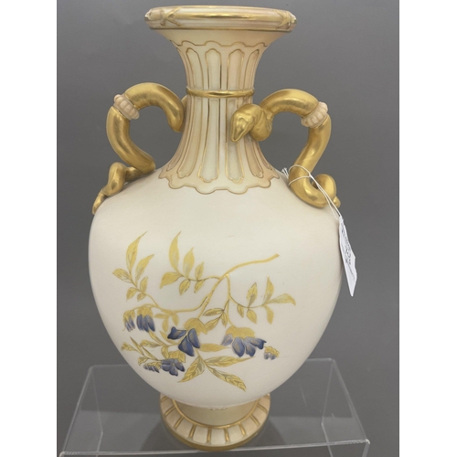 713 - Ceramics: Ceramics: A Royal Worcester blush ivory dahlia decorated vase, with gilded cobra handles, ... 