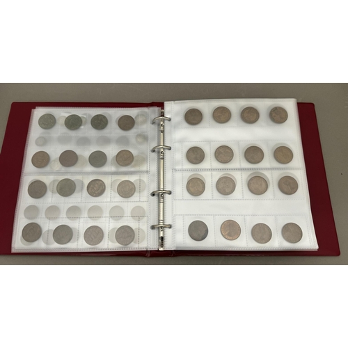 732 - Coins: Coins: An album of British coins, primarily 20th century, to include 36 crowns of various dat... 