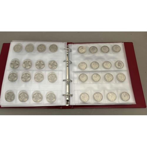 732 - Coins: Coins: An album of British coins, primarily 20th century, to include 36 crowns of various dat... 