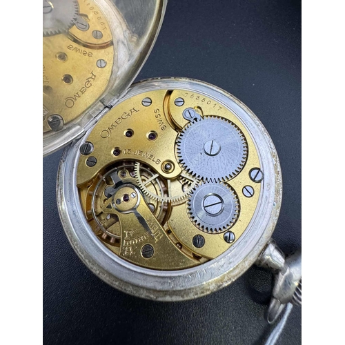 743 - Watches: Watches: A Swiss .800 grade silver cased Omega open faced pocket watch, with engine turned ... 