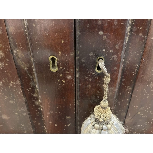 89 - 19th cent. 19th cent. Mahogany estate cabinet on stand the Greek key cut cornice above two panelled ... 