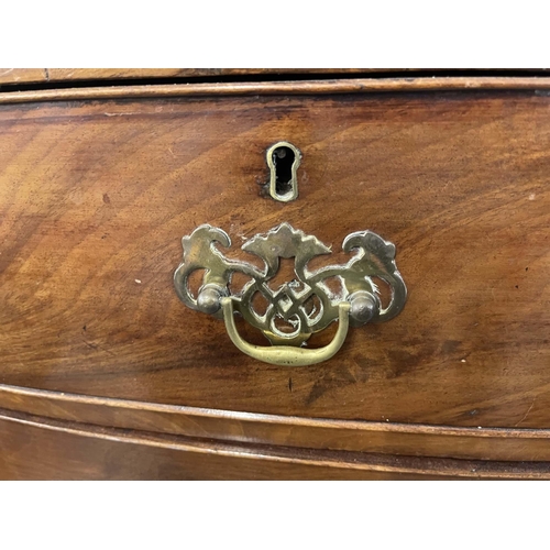 97 - Furniture: Furniture: Late 1820s mahogany bow fronted chest of drawers, two over three graduating dr... 