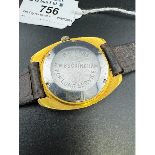 756 - Watches: 1970s/80 Garrard automatic watch, gold tone case and face on brown leather strap.... 