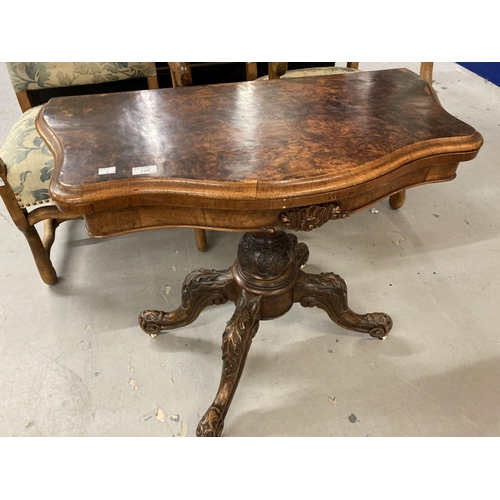 126 - Furniture: 19th cent. Walnut games table on single column support.