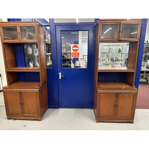 2 - Furniture: 20th cent. Chinese hardwood side cupboards, glazed cupboards above a three shelf rack ove... 