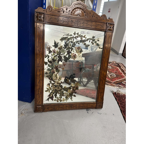 21 - Mirrors: 20th cent. Mahogany framed mirror, carved floral design, the mirror plate painted with hone... 