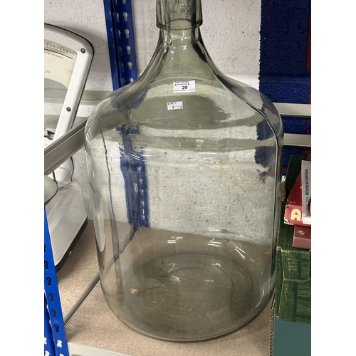 29 - Glass: Early 20th cent. Large glass bottle terrarium, 67cm tall, 120cm circumference.