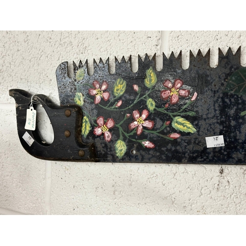 55 - Bargeware/Tools: 19th cent. Two person crosscut/rip saw, later decoration of typical bargeware flora... 