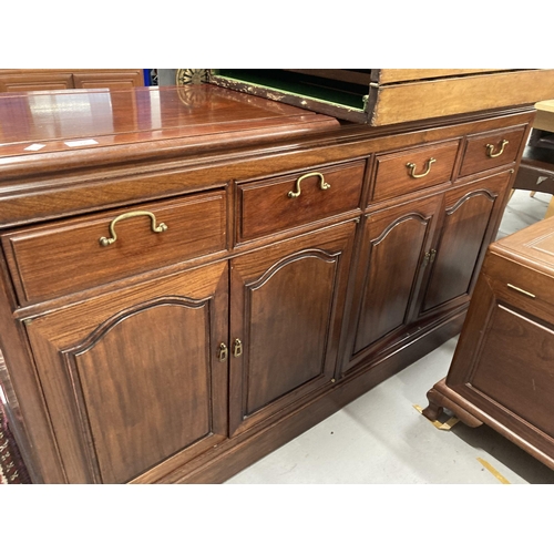 77 - Furniture: 20th cent. Reproduction sideboard four drawers over a pair of twin door cupboards. 151cm ... 