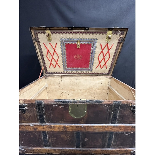 119 - ISMAY FAMILY: ISMAY FAMILY: Iron and leather bound dome trunk with fitted interior. The property of ... 