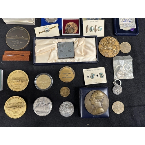 71 - OCEAN LINER: OCEAN LINER: Collection of Maiden Voyage and souvenir medals and medallions circa 1930s... 