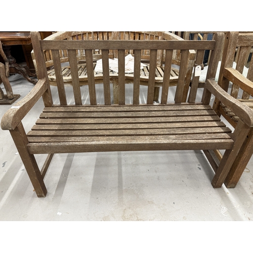 101 - Gardenalia: Gardenalia: Two seater teak straight back bench. 122cm x 90cm x 58cm.