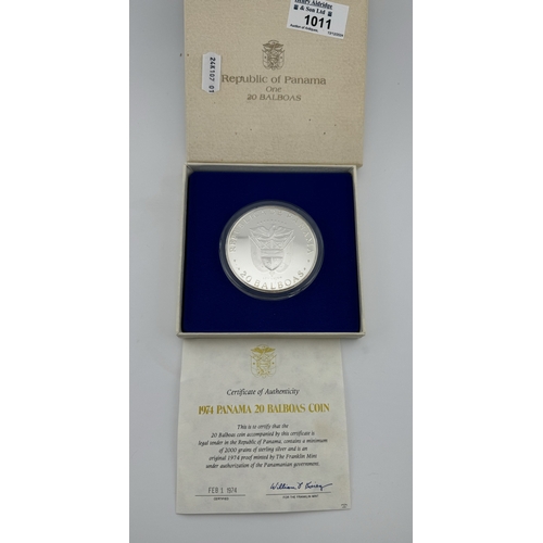 1011 - Coins: Coins: A 1974 Panama 20 balboas silver coin, minimum 2000 grains of silver. Encapsulated, box... 