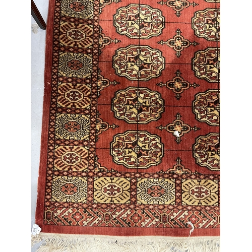 119 - Carpets & Rugs: Carpets & Rugs: Two 20th century Bakhara rugs the first with red ground, central... 