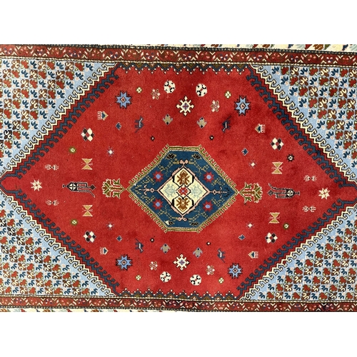 121 - Carpets & Rugs: Carpets & Rugs: 20th century Caucasian modern Kazak rug red ground, central diam... 