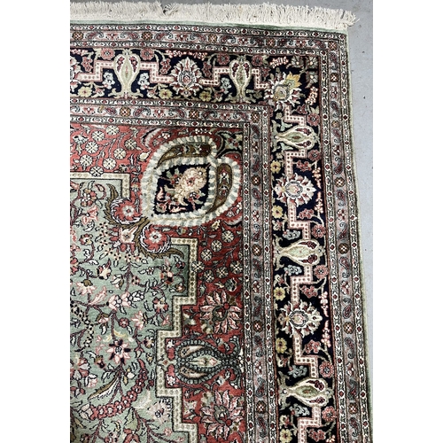 122 - Carpets & Rugs: Carpets & Rugs: North India silk carpet, green ground, central panel with floral... 