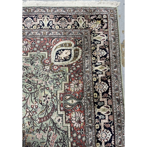 122 - Carpets & Rugs: Carpets & Rugs: North India silk carpet, green ground, central panel with floral... 