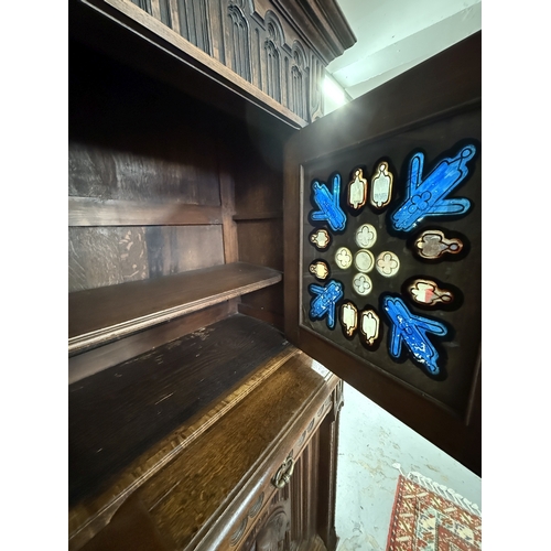 164 - Furniture Furniture: French Oak 'court cupboard'/livery cupboard circa 1880 in the Gothic Revival ma... 