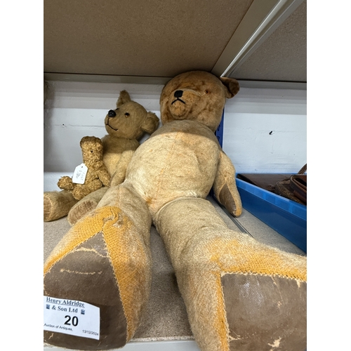 20 - Toys: Toys: Teddy bears 20th century plush teddy with glass eyes, jointed arms and legs, leather paw... 