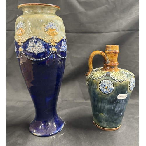 279 - Ceramics: Ceramics: A Royal Doulton stoneware baluster vase, dark blue ground, and applied band of f... 