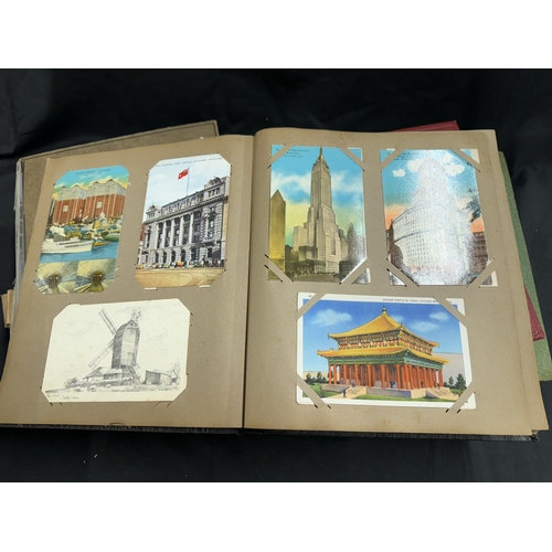 326 - Postcards Postcards: Postcards, four albums of Edwardian and later cards. The two larger contain Can... 