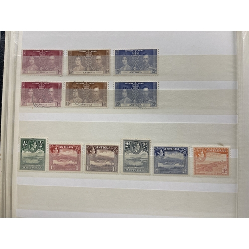 343 - Stamps Stamps: Commonwealth, four 32-leaf Stanley Gibbons stock books containing thousands of used a... 