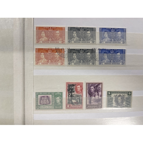 343 - Stamps Stamps: Commonwealth, four 32-leaf Stanley Gibbons stock books containing thousands of used a... 