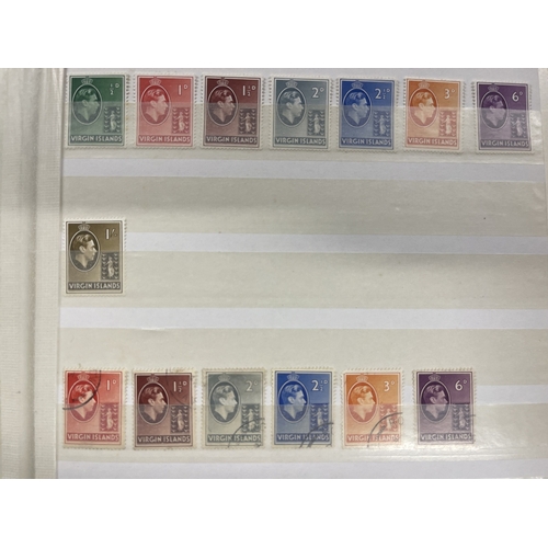 343 - Stamps Stamps: Commonwealth, four 32-leaf Stanley Gibbons stock books containing thousands of used a... 