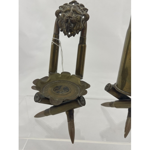 376 - Trench Art: Trench Art: An unusual pocket watch stand, the tripod base and side supports bullets, th... 