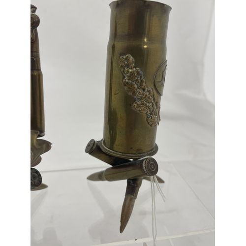 376 - Trench Art: Trench Art: An unusual pocket watch stand, the tripod base and side supports bullets, th... 