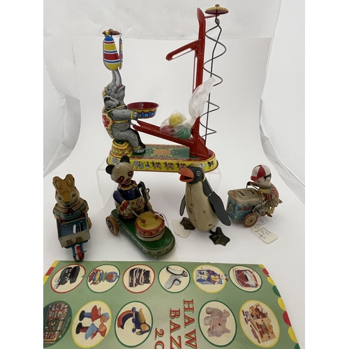 400 - Toys: Toys: 20th century Hawkins Bazaar tinplate repro wind up circus, elephant, rabbit and wheelbar... 