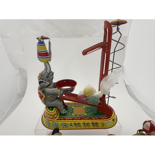 400 - Toys: Toys: 20th century Hawkins Bazaar tinplate repro wind up circus, elephant, rabbit and wheelbar... 