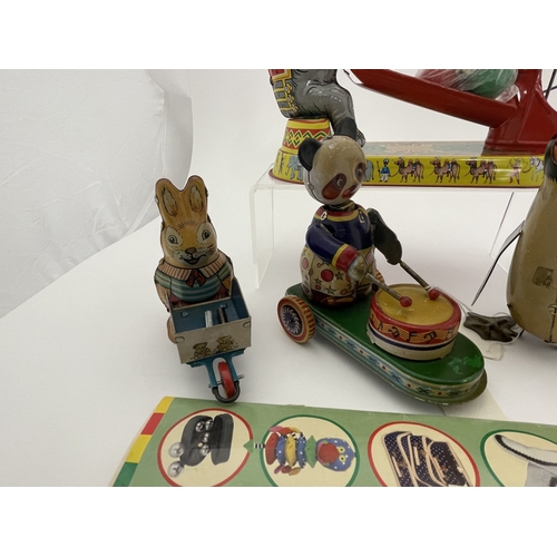 400 - Toys: Toys: 20th century Hawkins Bazaar tinplate repro wind up circus, elephant, rabbit and wheelbar... 