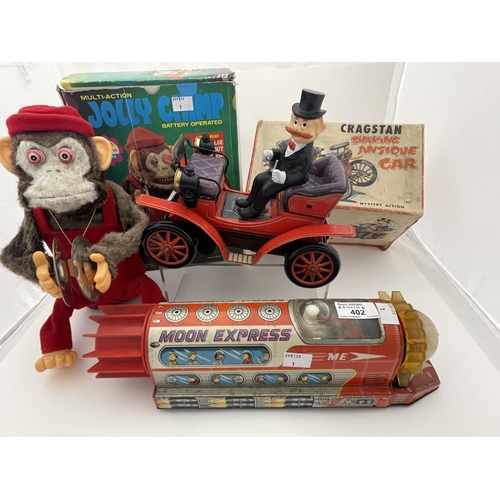 402 - Toys Toys: Jolly Chimp performing monkey (Taiwan) plus shaking antique car (Japan) Both battery oper... 