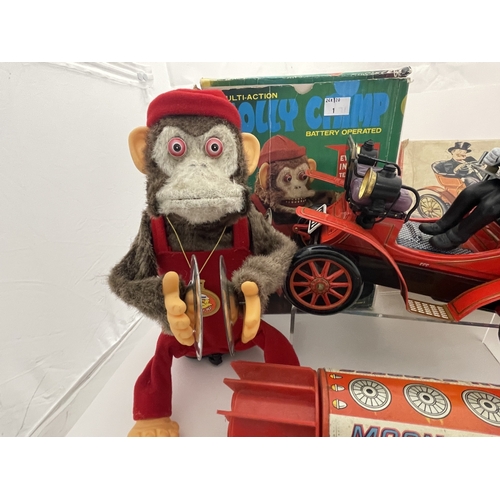 402 - Toys Toys: Jolly Chimp performing monkey (Taiwan) plus shaking antique car (Japan) Both battery oper... 