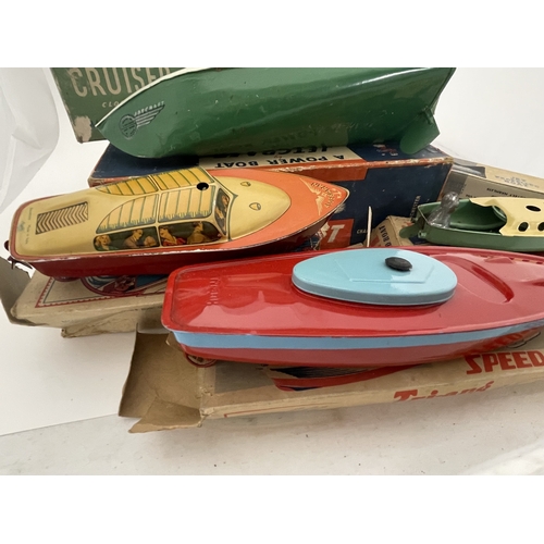 403 - Toys and Games Toys and Games: Template clockwork boats to include two mettoy high-speed motor launc... 