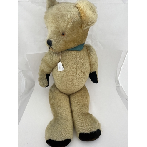 404 - Toys: Toys: A mid century plush teddy bear with articulated limbs, probably English. 78cm high.... 