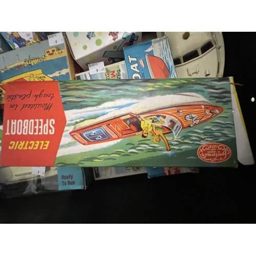 407 - Toys and Games Toys and Games: A collection of 10, 1960s and '70s plastic boats, all boxed except on... 