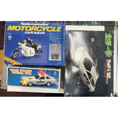 494 - Toys: Toys: Japanese radio control supercar, chief police patrol car (Son Al Toys) Entex motorcycle,... 